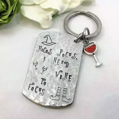 Hocus Pocus Need Focus Keyring can be made with a wine charm, book charm, whatever you need to focus! Letters and bewitching graphics are hand stamped. Delightful whimsical keyring.