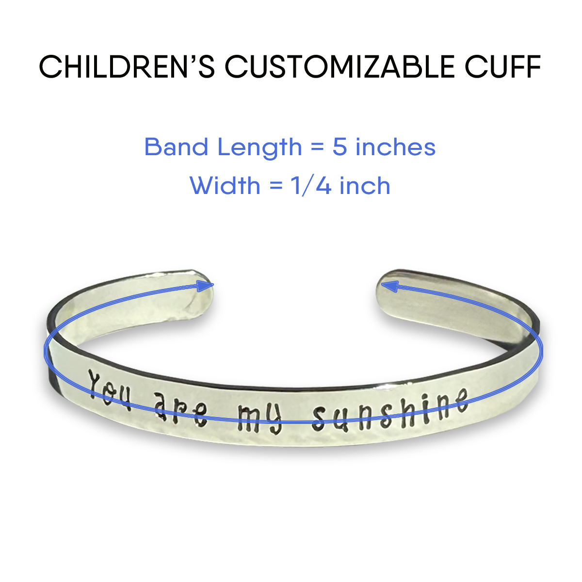 The Children’s Customizable Cuff Bracelet is silver with “You are my sunshine” engraved, a slightly open end, and measures 5" x 1/4". Blue lines and arrows show dimensions. Add your custom text above the engraving. Read more at Stamping Cat Studio (stampingcatstudio.com).