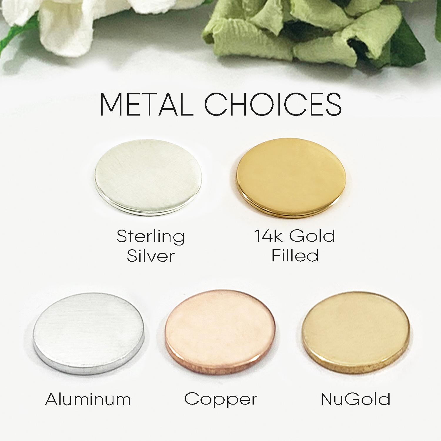 Five flat, round metal discs from the Metals all collection—Sterling Silver, 14k Gold Filled, Aluminum, Copper, and NuGold—each with unique color and finish are shown with white flowers and leaves, perfect for a Mother Daughter Heart Necklace Set. Read more at Stamping Cat Studio (stampingcatstudio.com).