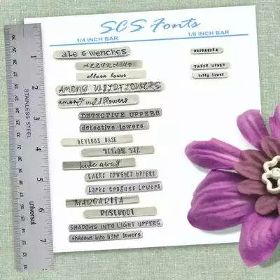 A font sample sheet labeled "SCS Fonts" shows text strips in various handwritten and typed styles. Next to it, The Love Collection Cuff Bracelet is displayed with a metal ruler and purple fabric flower on a green textured background. Read more at Stamping Cat Studio (stampingcatstudio.com).