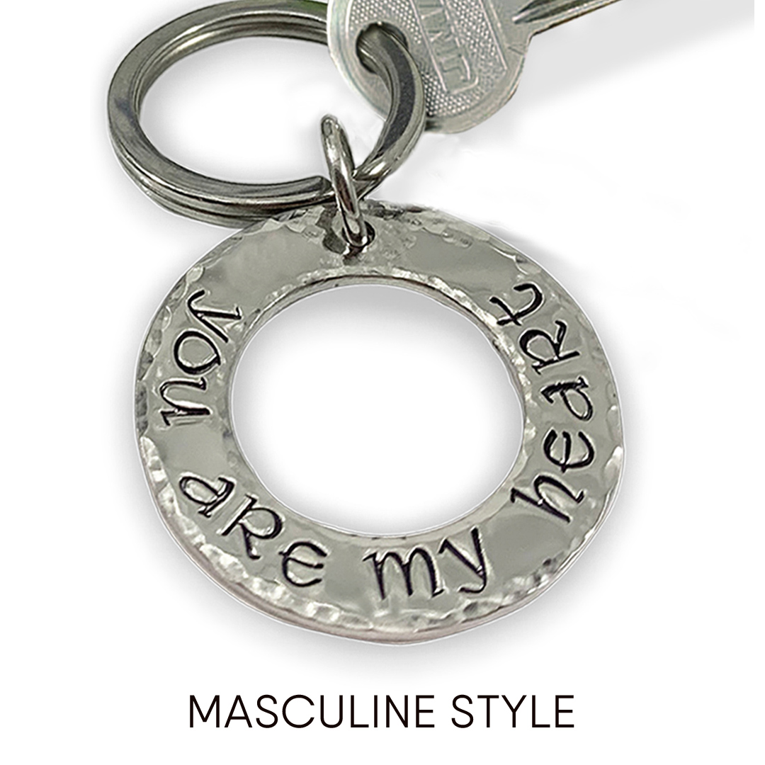 The My Love key ring masculine words features a silver keychain with a round, hammered charm engraved "You are my heart," attached to a standard silver key. "MASCULINE STYLE" is printed below. Read more at Stamping Cat Studio (stampingcatstudio.com).