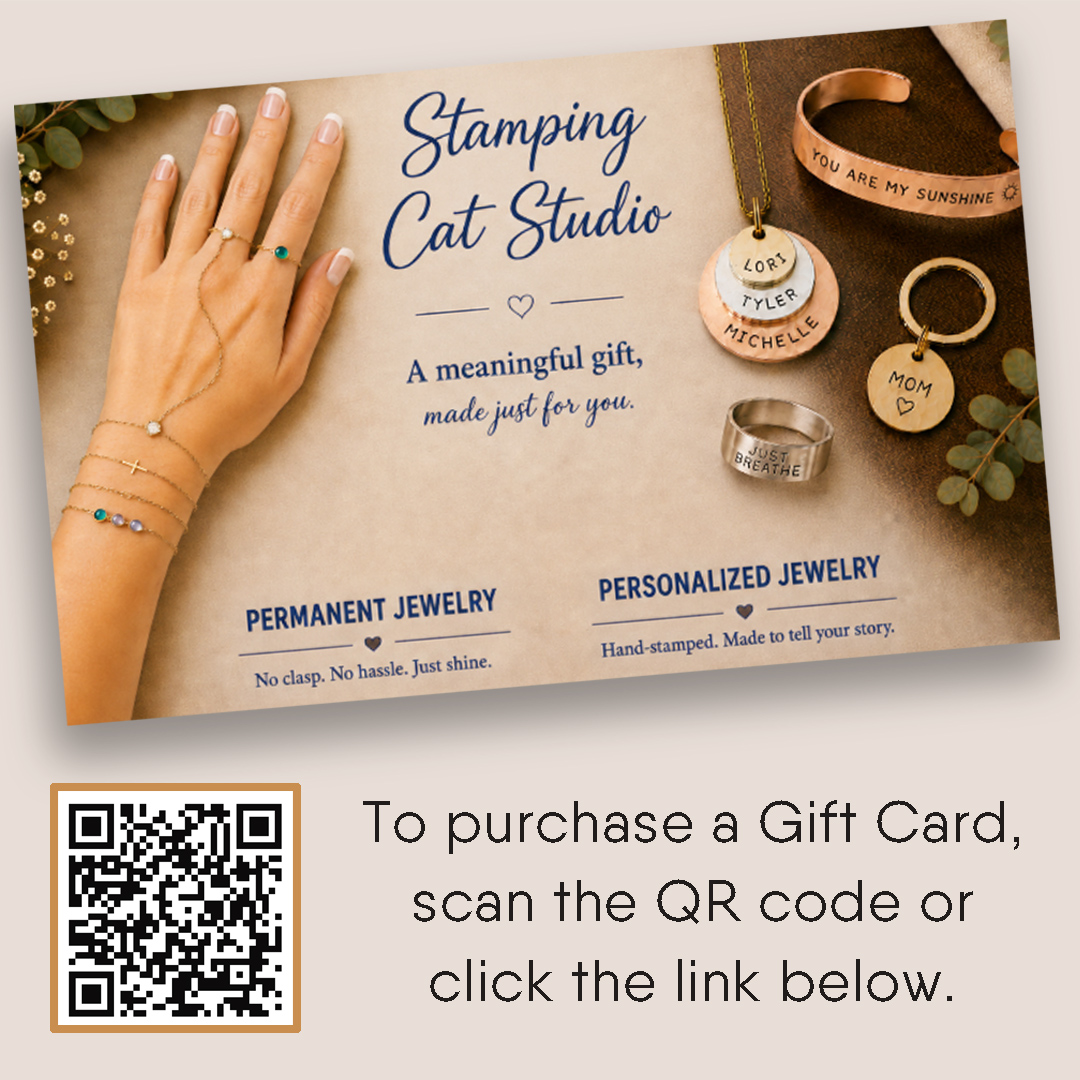 A hand adorned with gold bracelets rests beside engraved rings and necklaces bearing words like “Mom,” “Love,” and “You Are My Sunshine.” Text promotes Stamping Cat Studio’s permanent and personalized jewelry, with a QR code to purchase a Gift Card NL. Read more at Stamping Cat Studio (stampingcatstudio.com).